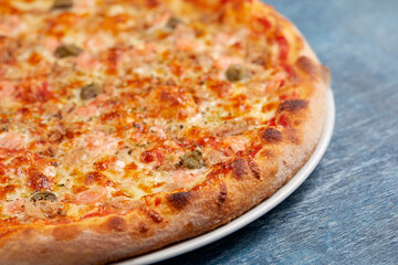pizza on the wooden background