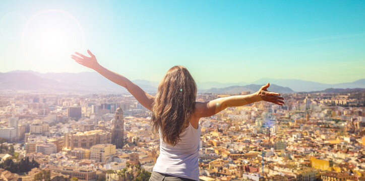 woman traveler looking at city landscape view panorama- Malaga