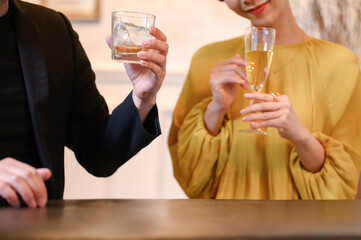 Image of man and woman toasting