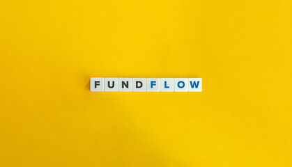 Fund Flow Phrase on Letter Tiles on Yellow Background. Minimal Aesthetics.