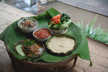 Thai northern food as local name Khan Tok, it is traditional of people  for meals, serve with steam rice and vegetable 