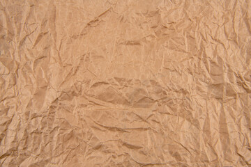 Brown crumpled paper background vignette