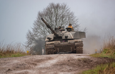 Fototapeta premium British army FV4034 Challenger 2 main battle tank in action on a military exercise, Salisbury Plain Wiltshire UK