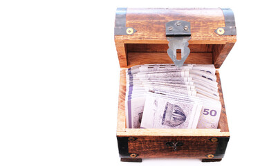 Wooden chest stuffed with Danish kroner bills