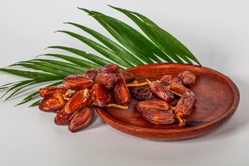 Dried dates (fruit of Phoenix dactylifera dates). Clipping paths for both the object and the shadow. Infinite depth of field, retouched. Set, bundle,