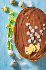 Fototapeta na wymiar Homemade Easter cake on blue wooden background