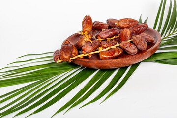 Dried dates (fruit of Phoenix dactylifera dates). Clipping paths for both the object and the shadow. Infinite depth of field, retouched. Set, bundle,