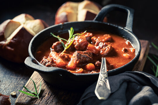 Hot and tasty goulash served with fresh hot buns