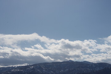 Obraz premium clouds over the mountains