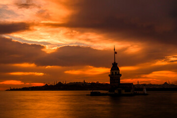 golden clocks and a girl tower.maiden's tower