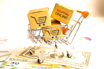 .Online shopping, Shopping cart box with money, import export, finance commerce.