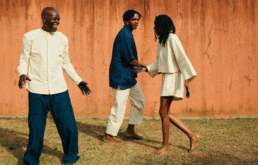 group of african eco textile entrepreneurs laughing