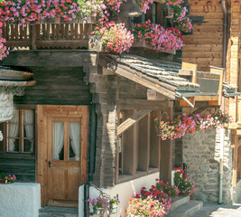 Fototapeta na wymiar Wooden houses in the Swiss Alps
