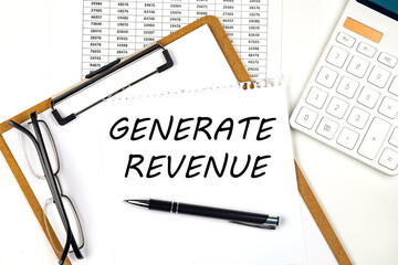 Text GENERATE REVENUE on the white paper on clipboard with chart and calculator