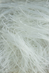 White feathers background. Image of portion of food. 