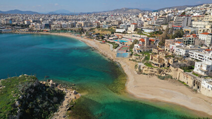Fototapeta premium Aerial drone photo of beautiful round harbour and beach front of Zea or Passalimani in the heart of Piraeus, Attica, Greece