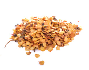 Dry chili pepper seeds isolated on white background