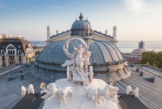 Roof statue of Opera and Ballet Theater Odesa Ukraine sightseeing. Aerial photography. Top view. Space for text. Statue of Greek goddess Melpomene in a chariot drawn by four panthers.