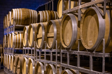 Production of sweet cassis creme liquor and strong marc from ripe black currant berries, distillation and maturation in wooden barrels. Burgundy, France