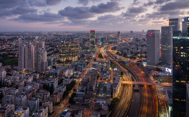 Tel Aviv city aerial evening panorama above: Ayalon river and modern skyscrapers