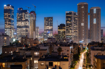 Fototapeta premium Tel Aviv and Ramat Gan night city view. Residential area and high-rise office buildings