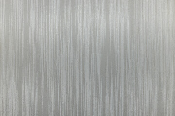 Messy grunge textured wall surface with striped pattern