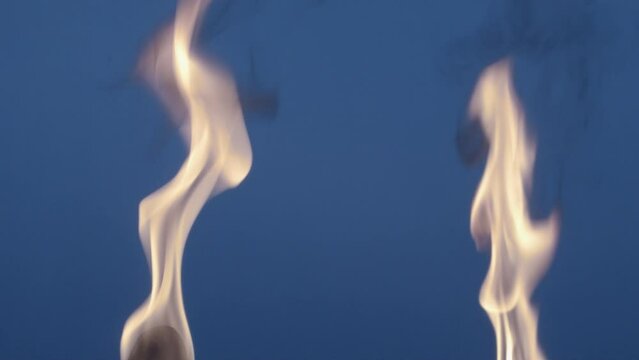 Ancient style torches with fire in a bluescreen backdrop