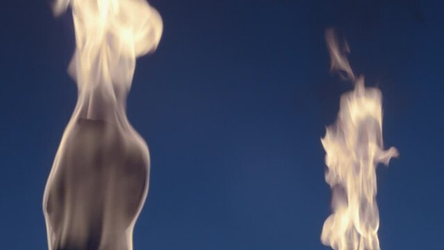 Ancient style torches with fire in a bluescreen backdrop