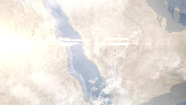 Earth zoom in from outer space to city. Zooming on Taif, Saudi Arabia. The animation continues by zoom out through clouds and atmosphere into space. Images from NASA