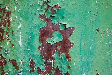 Rust and scratched paint on metal