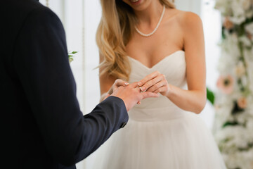 Obraz na płótnie Canvas Wedding ceremony, exchange of wedding rings.