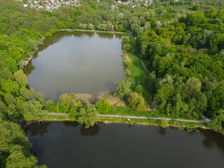 Kyiv, Ukraine.Goloseevsky lakes located on the territory of Goloseevsky park. Aerial drone view. - 490910573