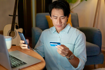 man online shopping with card