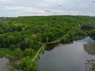 Fototapeta na wymiar Kyiv, Ukraine.Goloseevsky lakes located on the territory of Goloseevsky park. Aerial drone view.