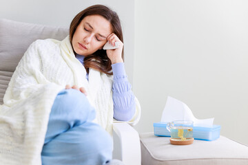 Sick woman resting at home