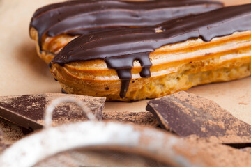 chocolate-covered custard eclair with creamy chocolate cream