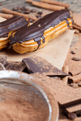 chocolate-covered custard eclair with creamy chocolate cream
