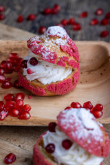 red cranberry-flavored cake with cranberry berries and creamy milk filling