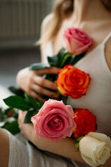 Beautiful woman in white dress with flowers