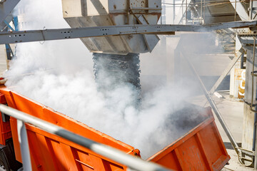 Photo of loading process of construction material at factory