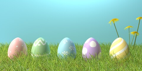 Colorful hand decorated Easter eggs with spring grass and flowers