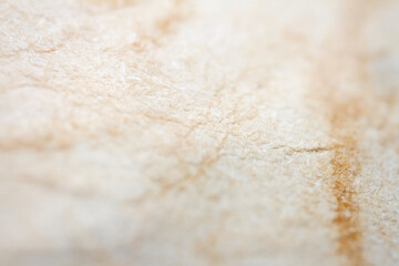 Extreme closeup of biege handmade paper