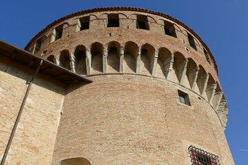 Closeup on the circular bastions made of red bricks in Sforza Fortress in Dozza