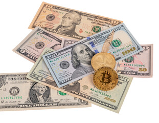 Bitcoin coins at dollar notes pile isolated on white background. Cryptocurrency and cash money concept. High quality photo