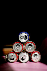 Stack of cans for reuse and recycle. Empty cans top view.	