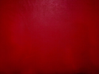 Dark red leather background with empty copy space. Dark red leather texture.