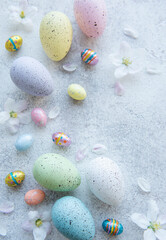 Colorful Easter eggs on concrete background