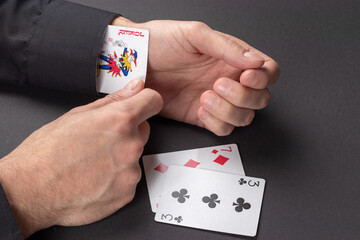 playing cards in hand