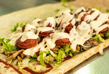 shawarma with bavarian sausage and garlic sauce