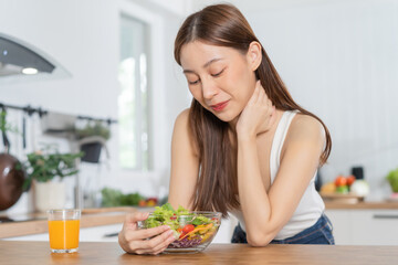 Obraz na płótnie Canvas Diet, Dieting, pretty slim asian young woman or girl smiling, looking at mix vegetables, green salad bowl, eat vegetarian food is low fat good healthy. Nutritionist weight loss for health person.